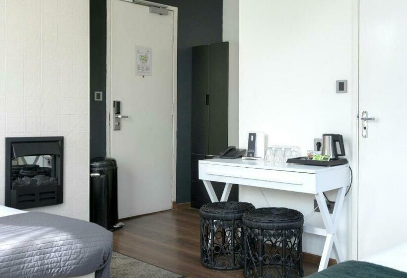 اتاق استاندارد سه تخته با چشم‌انداز, Quentin Amsterdam