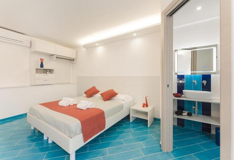 Quarto Estandar, Corallo Residence
