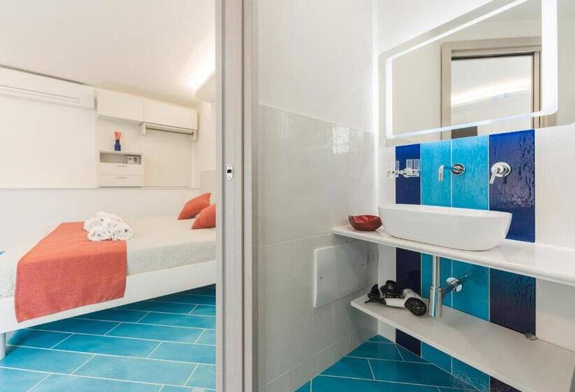 Quarto Estandar, Corallo Residence