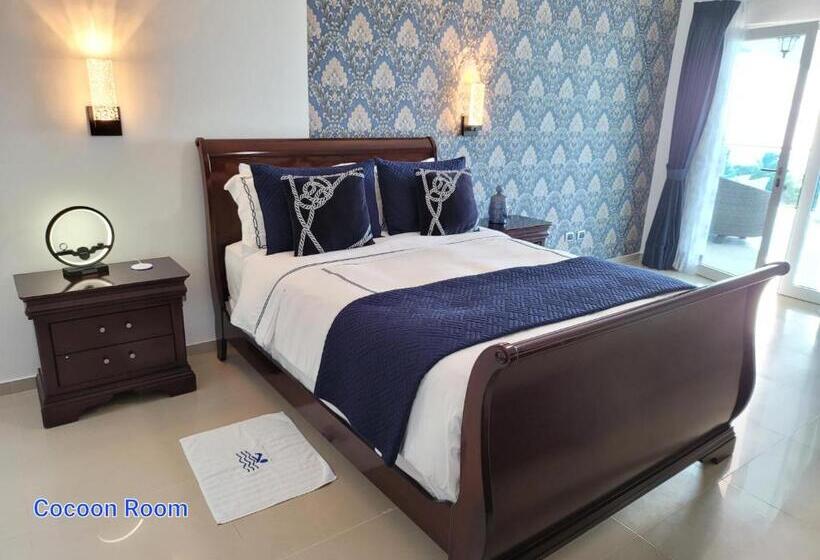 اتاق لوکس با بالکن و چشمانداز دریا, Casaenjoysamana