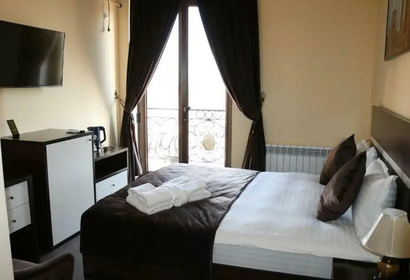 キングサイズベッドのスタンダードルーム, Marhabo Hotel Palace