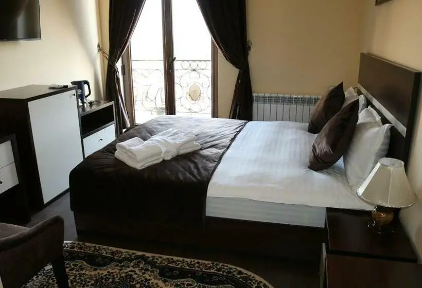 キングサイズベッドのスタンダードルーム, Marhabo Hotel Palace