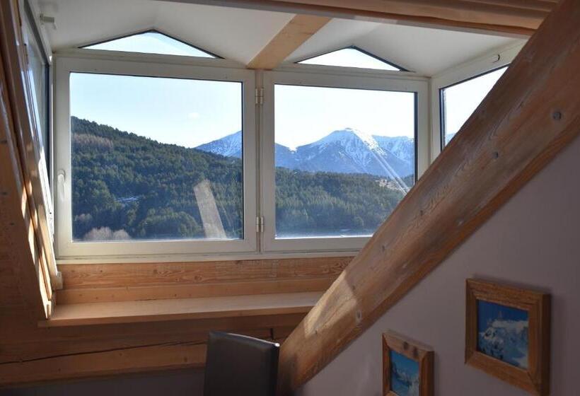 جناح جونيور مطل على الجبل, Corrieu