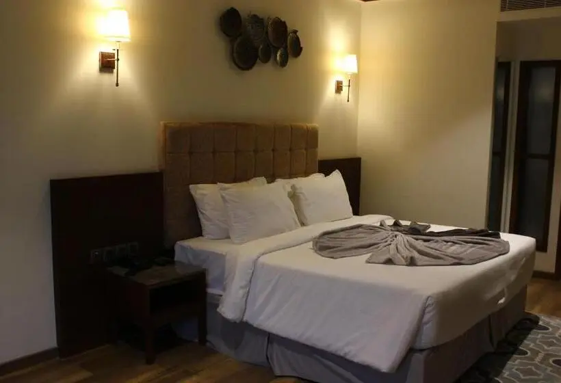 キングサイズベッドのデラックスルーム, Niraamaya Retreats Samroha Athirappilly