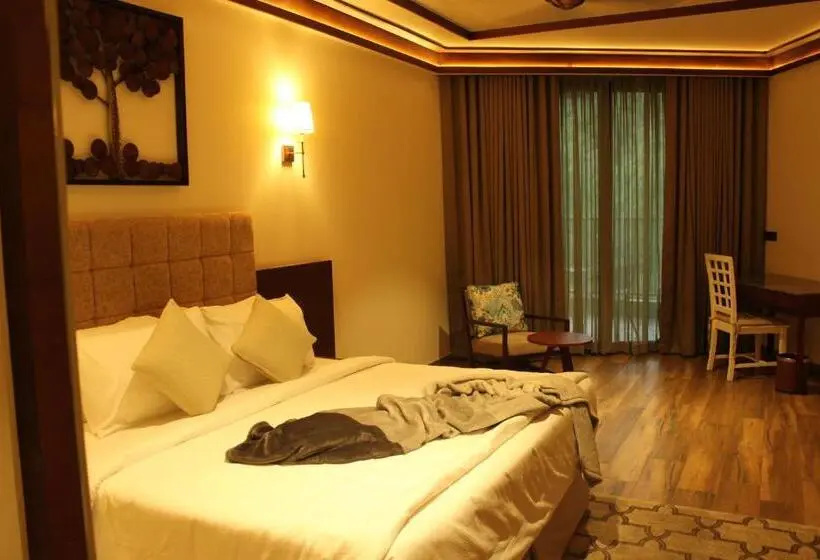 キングサイズベッドのデラックスルーム, Niraamaya Retreats Samroha Athirappilly