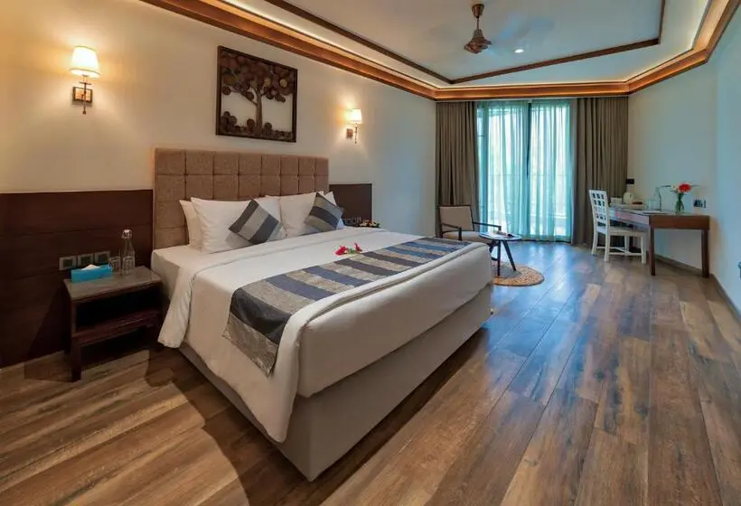 キングサイズベッドのデラックスルーム, Niraamaya Retreats Samroha Athirappilly