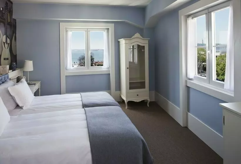 Quarto superior vista rio, Lx Boutique