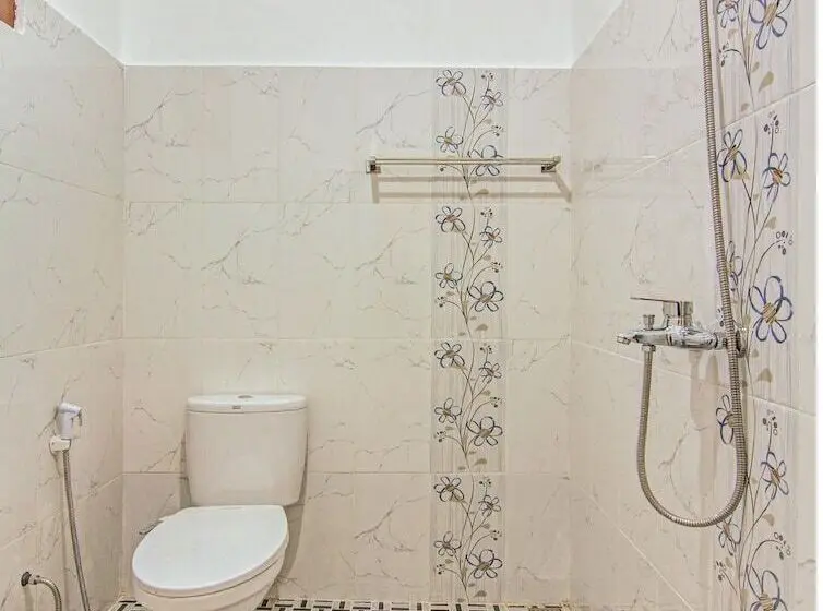 デラックスルーム, Capital O 90643 Suri Guest House Syariah