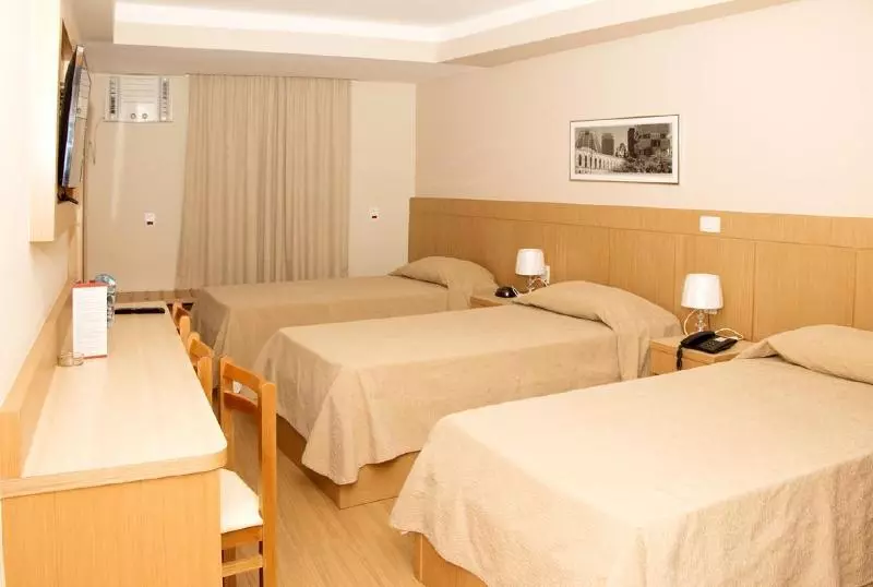 Deluxe Kolmen Hengen Huone, Pouso Real