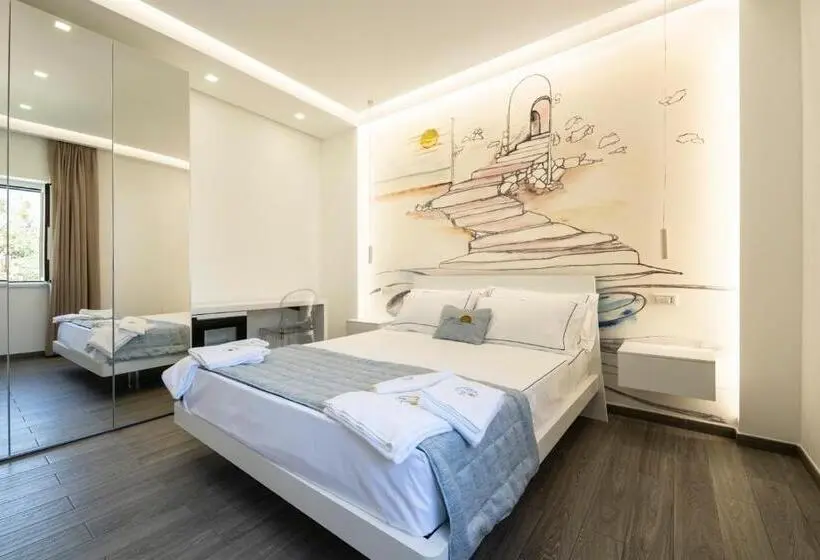 片側に海が見えるデラックスルーム, Mbaccimari B&b