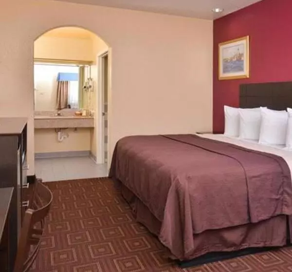 キングサイズベッドのスタンダードルーム, Americas Best Value Inn Baytown