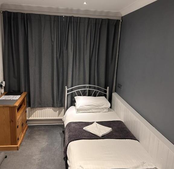 חדר סטנדרד יחיד חדר אמבטיה משותף, Rock House Bed And Breakfast