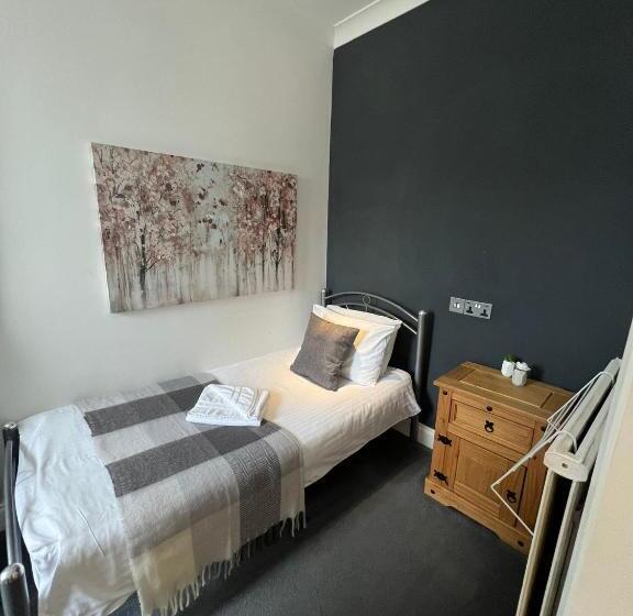 חדר סטנדרד יחיד חדר אמבטיה משותף, Rock House Bed And Breakfast