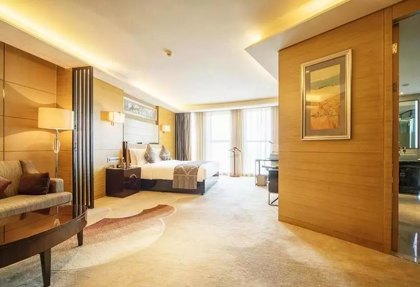 キングサイズベッドのデラックスルーム, Pullman Wuxi New Lake