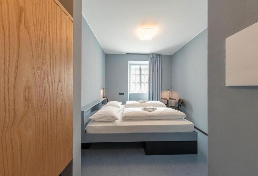 Номер Стандарт, Cusanus Akademie   Accademia Cusanus