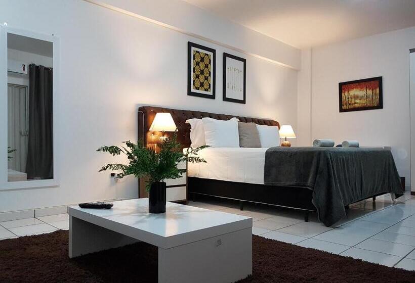 חדר דלוקס עם מיטת קינג, B & A Suites Inn Hotel   Quarto Luxo âmbar