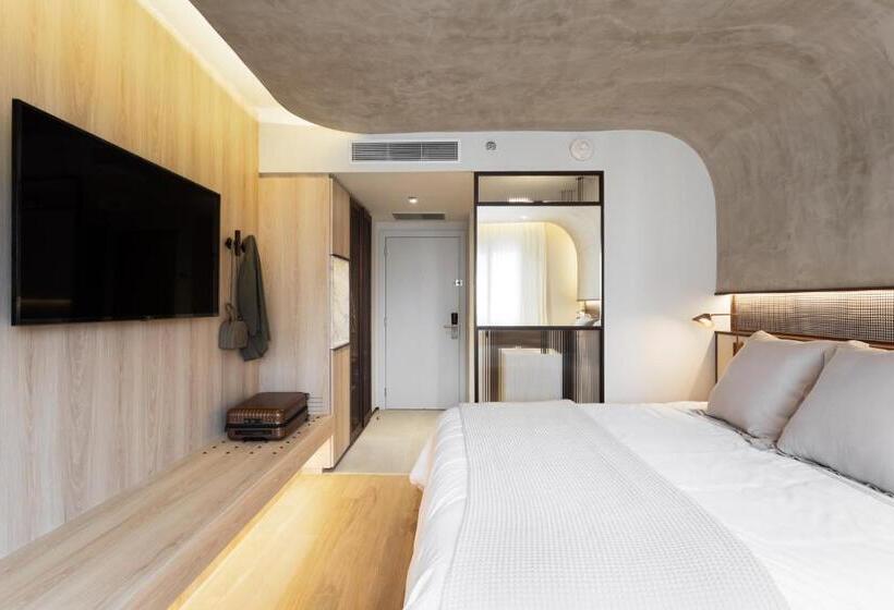 디럭스 룸 킹사이즈 침대, Qoya Hotel Curitiba, Curio Collection By Hilton