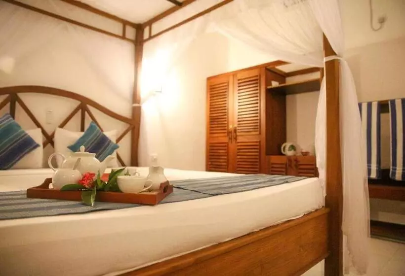 Deluxe Kolmen Hengen Huone, Oasey Beach