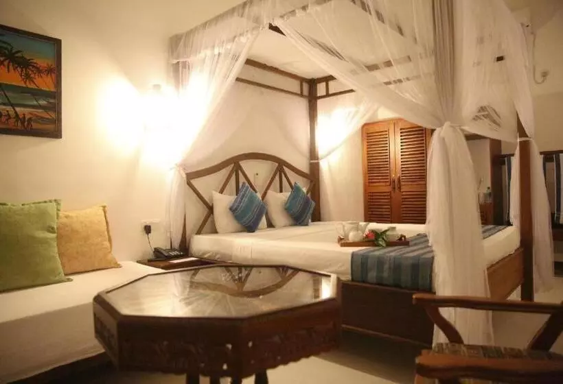 Deluxe Kolmen Hengen Huone, Oasey Beach