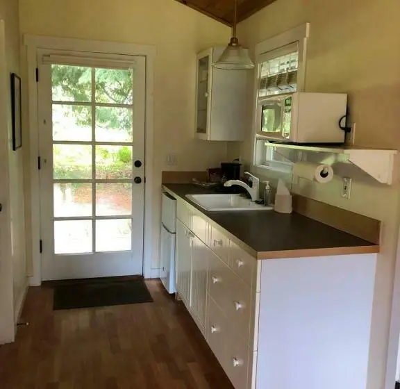キングサイズベッドのデラックススイート, Lopez Farm Cottages & Tent Camping