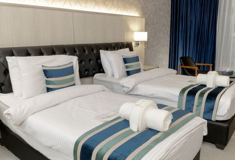 اتاق لوکس با چشم‌انداز شهر, Nishan