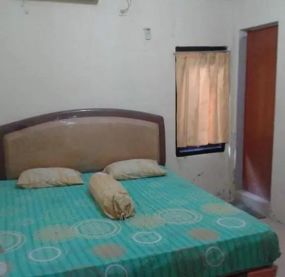 اتاق اکونومی, Kenangan Guest House
