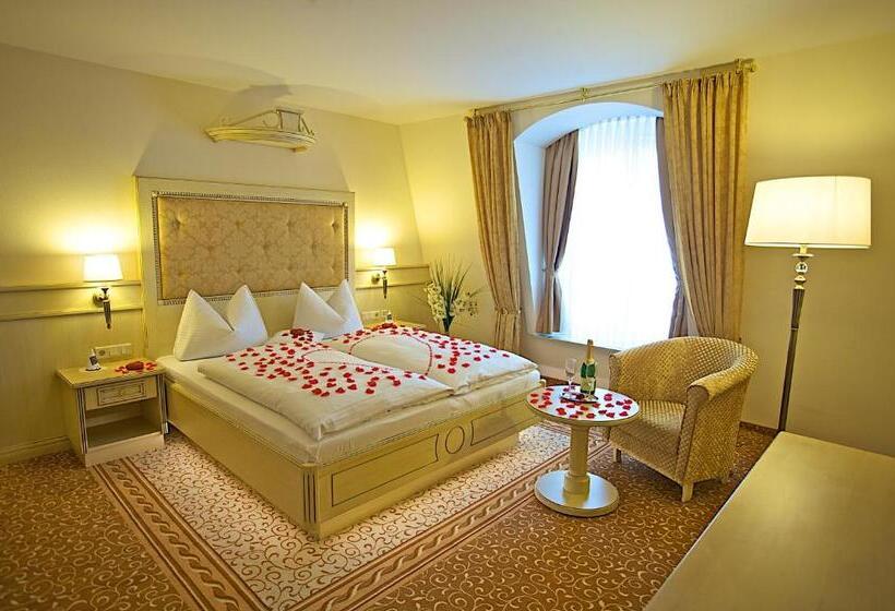 Номер Deluxe, Am Schloßberg