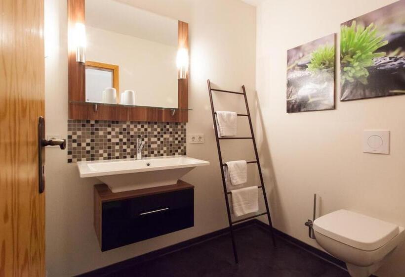 コンフォートルーム, Am Grudenberg