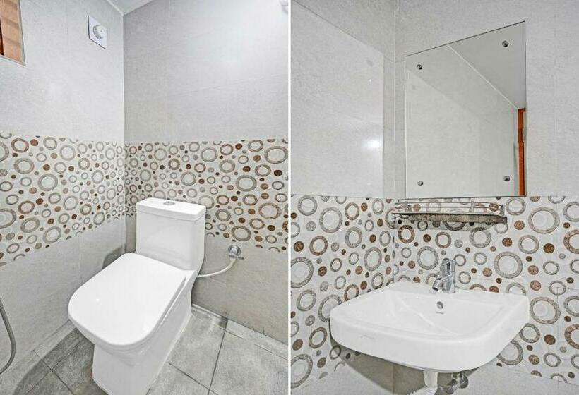 Quarto Triplo Deluxe, Capital O 90121 Madison Blue