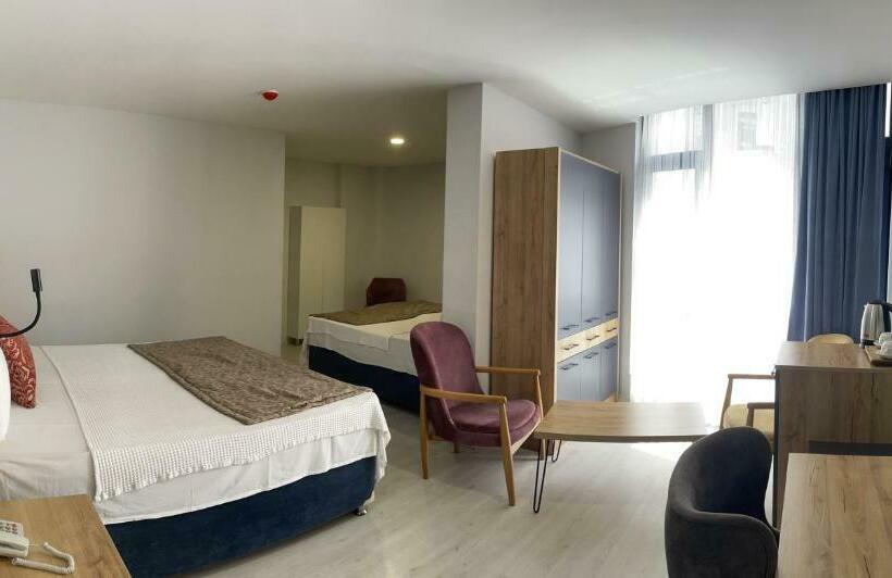 高级三人间, Hann Otel