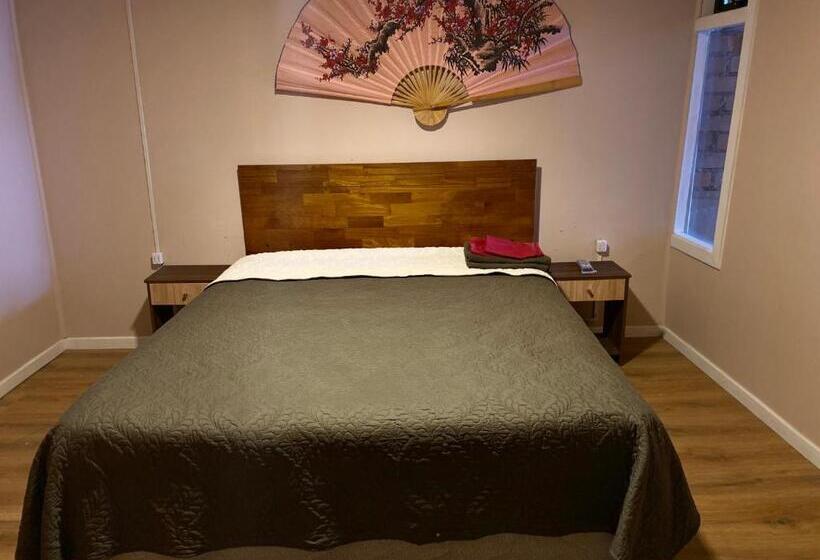 Standaardkamer met Gedeelde Badkamer, World S End Hostal