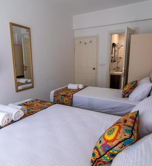 اتاق استاندارد سه تخته با چشمانداز باغ, Bozcaada E2 Deniz Otel