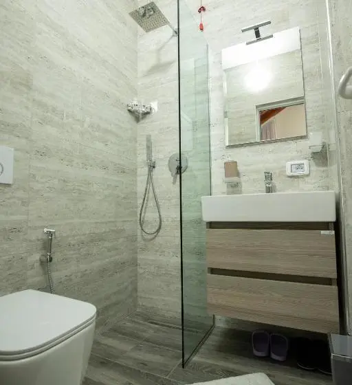 Quarto Triplo Standart, Xhuli Guesthouse