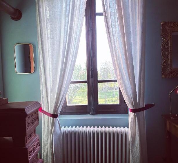 سوییت با چشمانداز باغ, B&b Podere Merlo