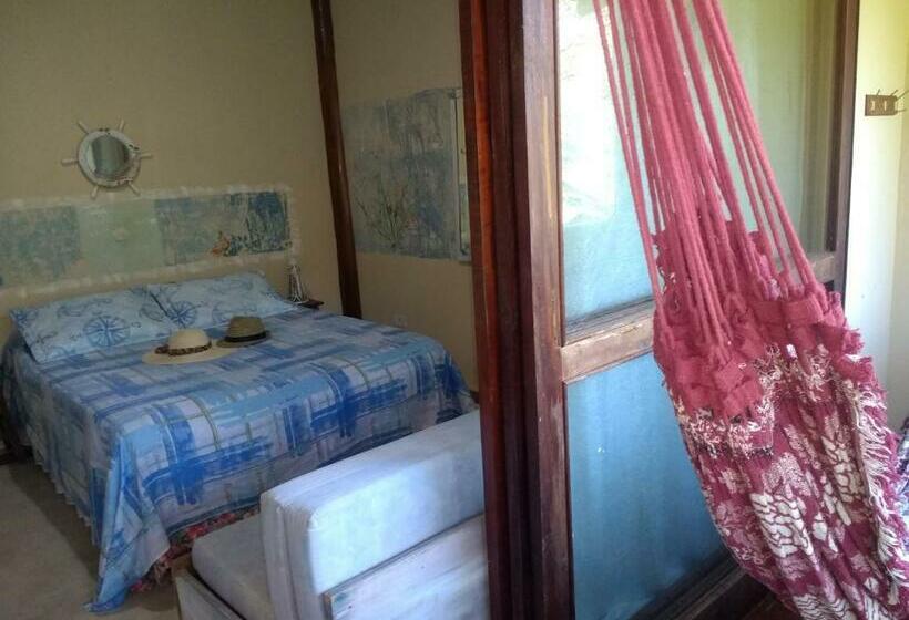 Quarto Triplo Estandar com Sacada, Manacá Suítes Prumirim