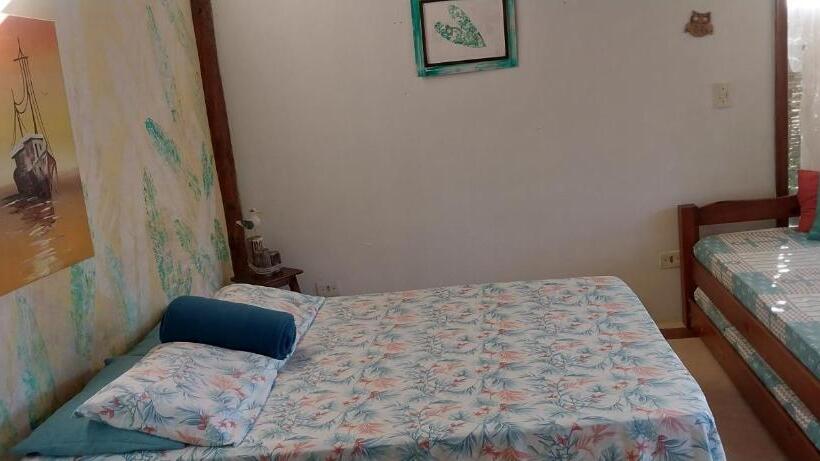 Quarto Triplo Estandar com Sacada, Manacá Suítes Prumirim