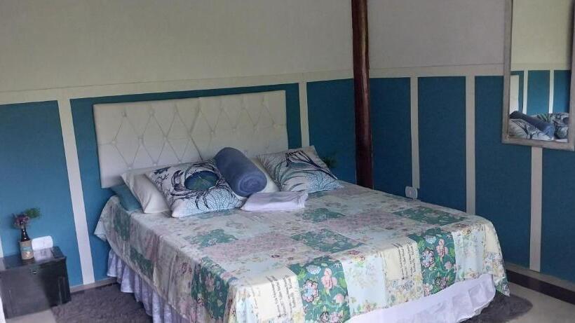 Quarto Triplo Estandar com Sacada, Manacá Suítes Prumirim