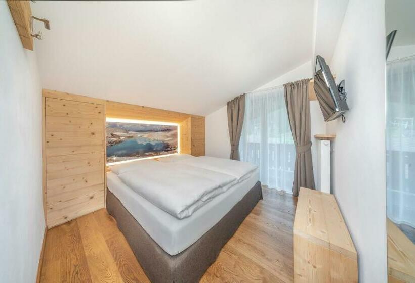 Quarto Estandar, Garni Tramans
