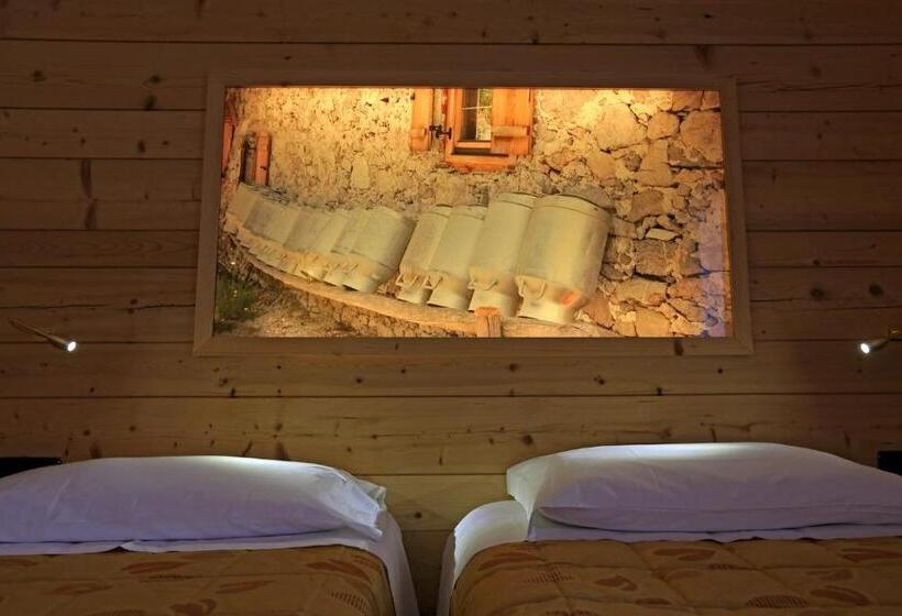 חדר דלוקס, Ladina