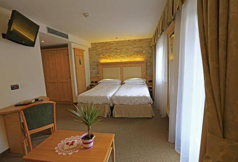 חדר דלוקס, Ladina