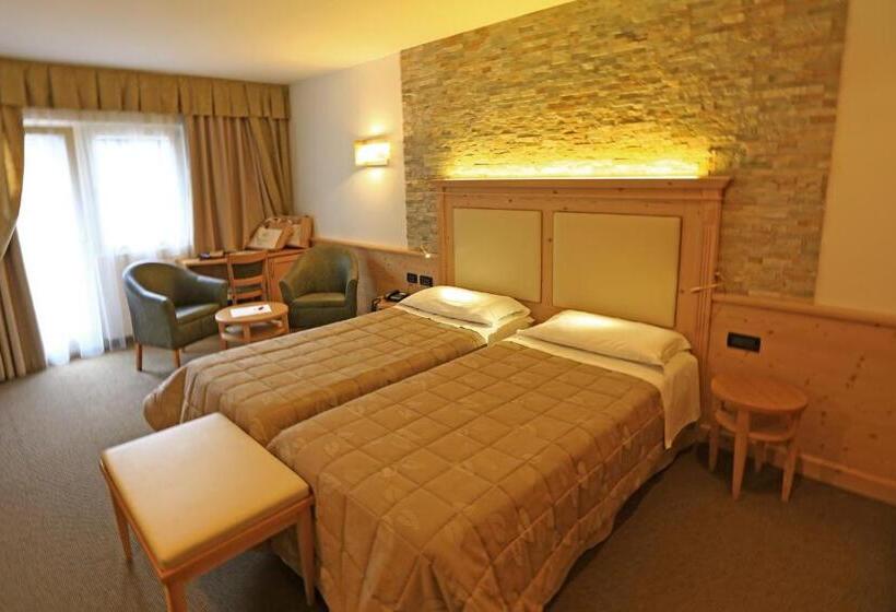 חדר דלוקס, Ladina