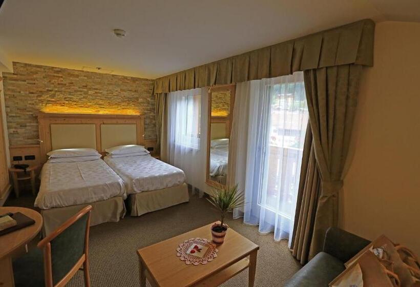 חדר דלוקס, Ladina