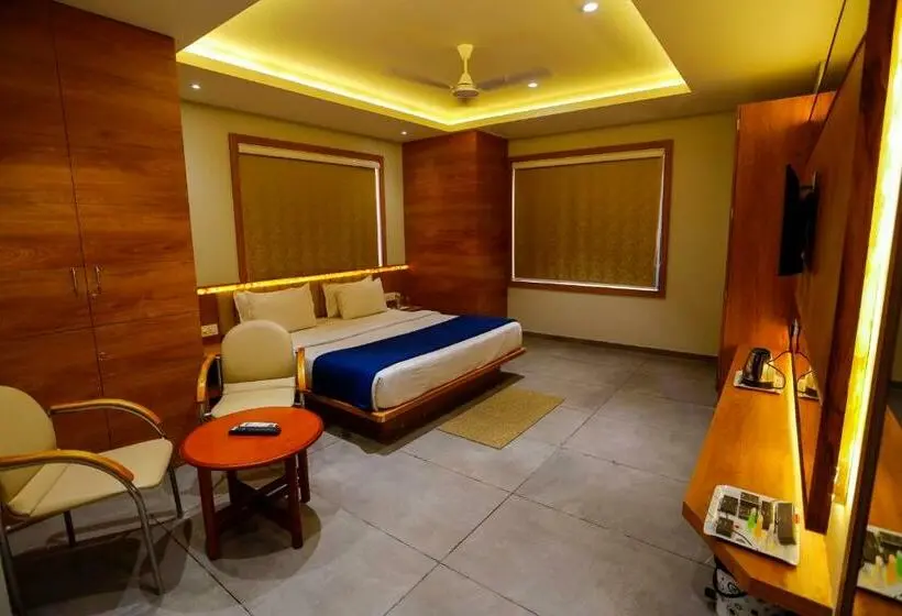 Deluxe Kamer, Om