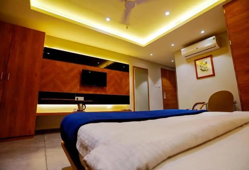 Deluxe Kamer, Om