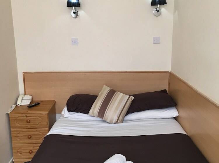 חדר סטנדרד יחיד חדר אמבטיה משותף, Smiths