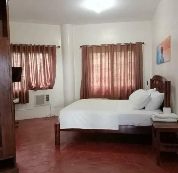 キングサイズベッドのデラックスルーム, Medellin Seaview Inn
