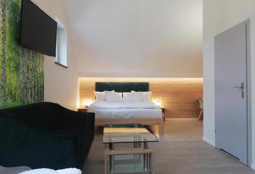 スタンダード4人部屋, U źródeł