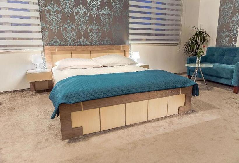 חדר דלוקס, Tm