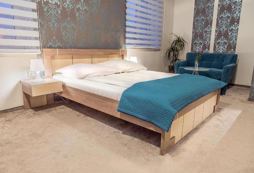 חדר דלוקס, Tm