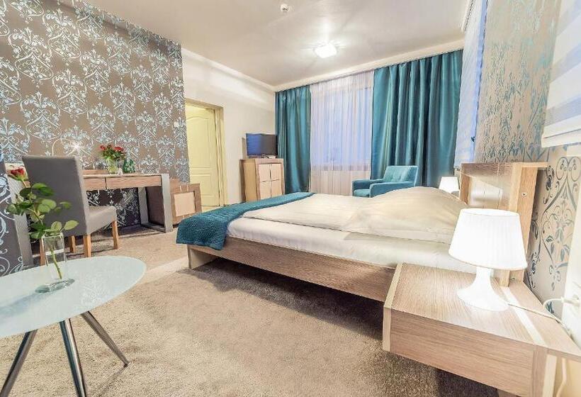 חדר דלוקס, Tm